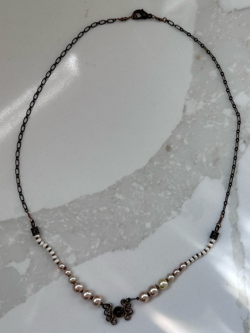 faux pearl gunmetal necklace